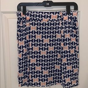 Alya size large mini skirt w/ bow tie pattern